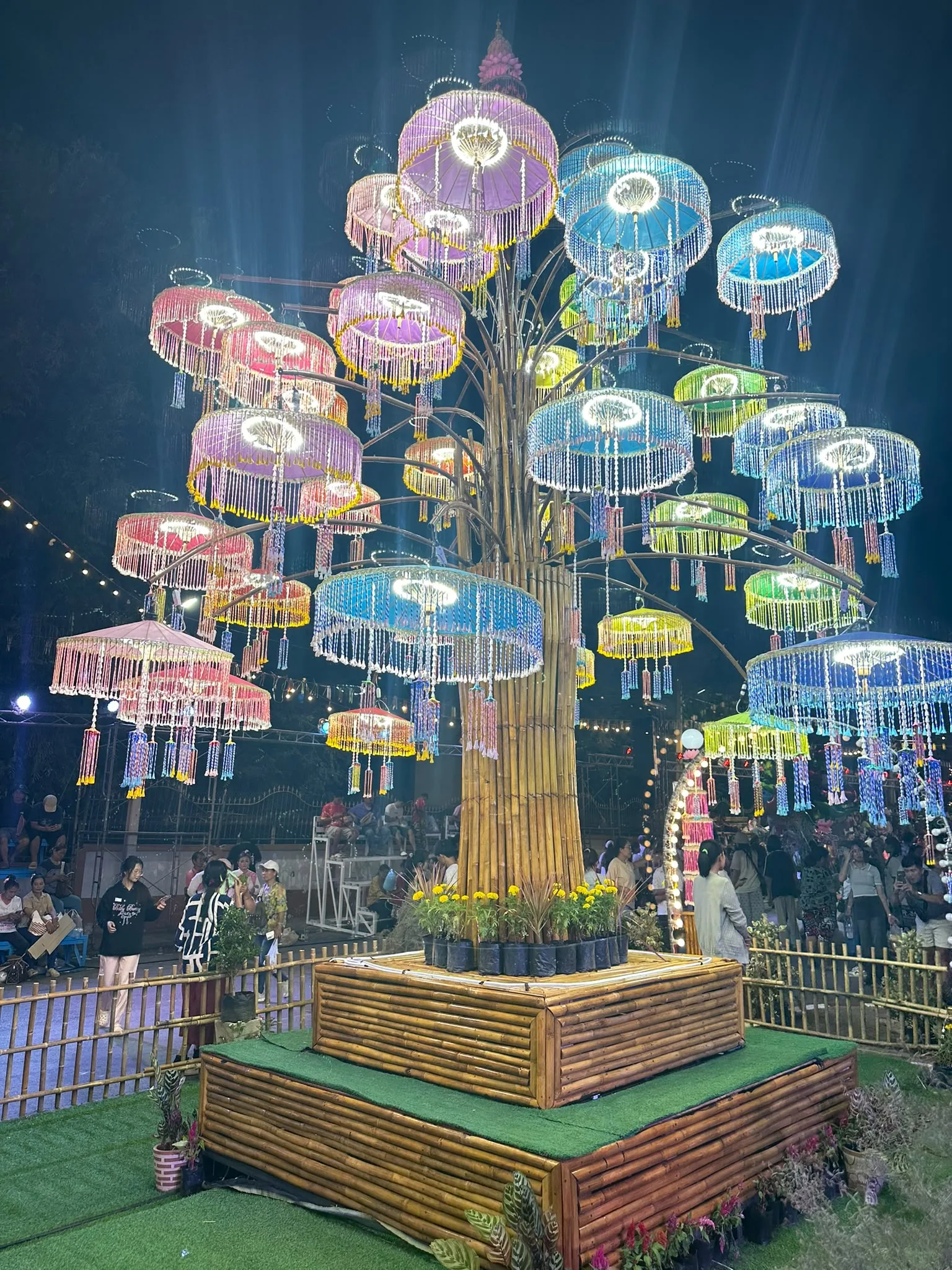 Tiers of coloured incense, hung like parasols