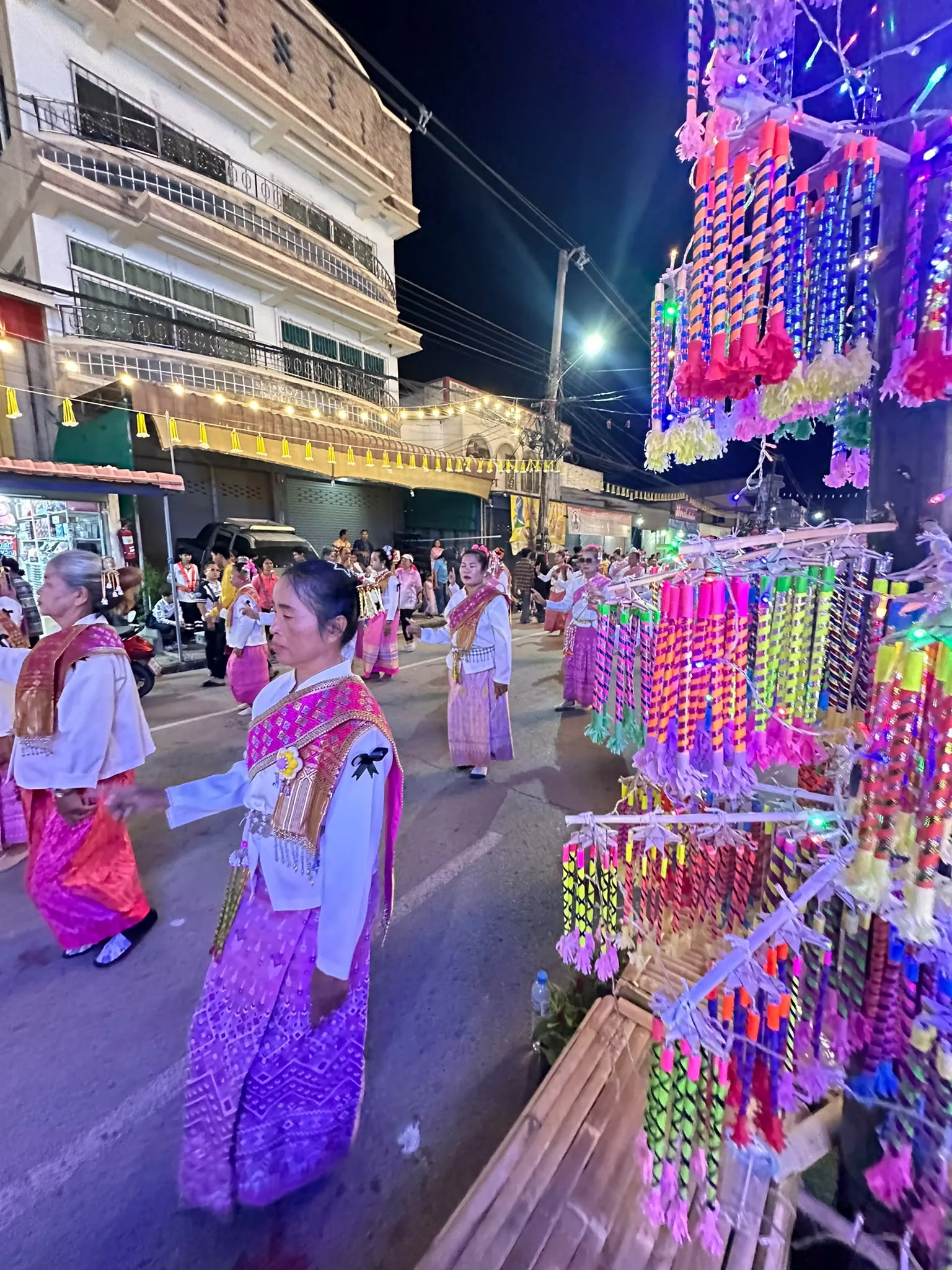 A dancer beside the hanging incense