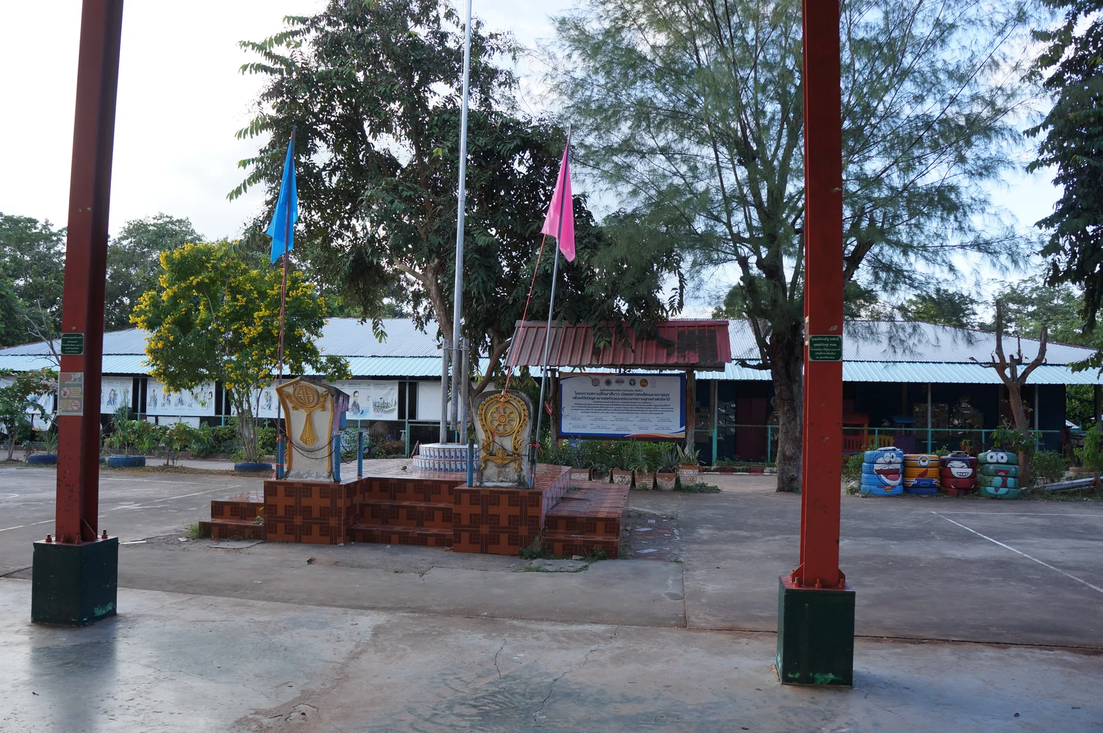 The schoolyard and the flagpoles